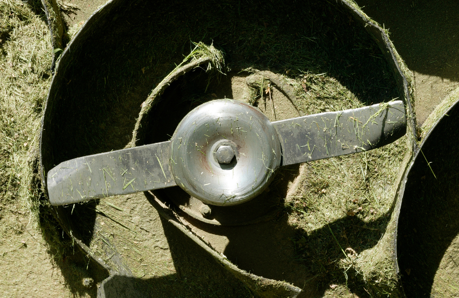 Bottom view of lawn mower showing blade